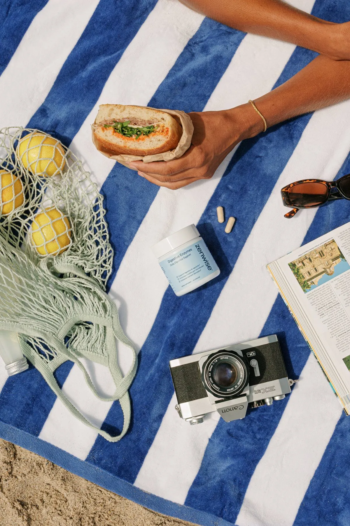 Beach towel flat lay with Digestive Enzymes